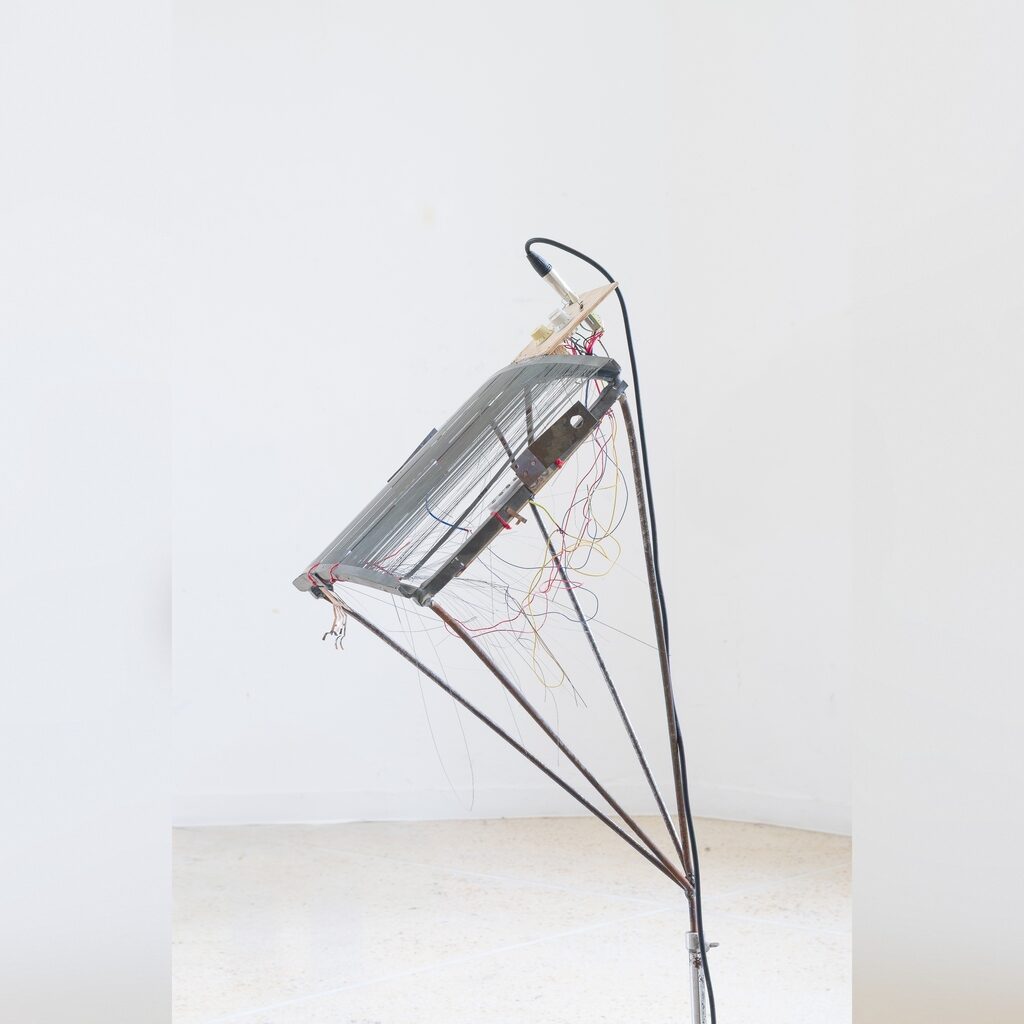 A sculpture that resembles a music stand.