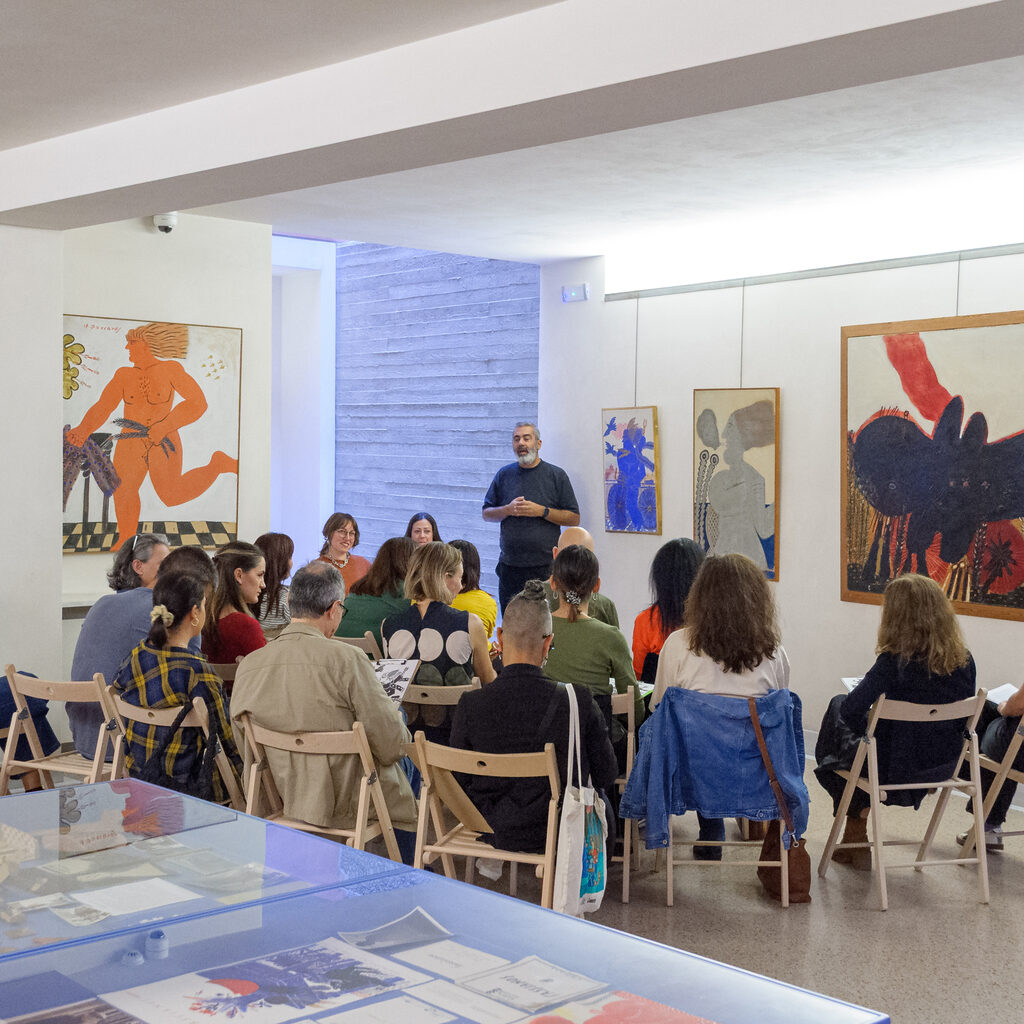 Seated group of participants in Alekos Fassianos Museum.