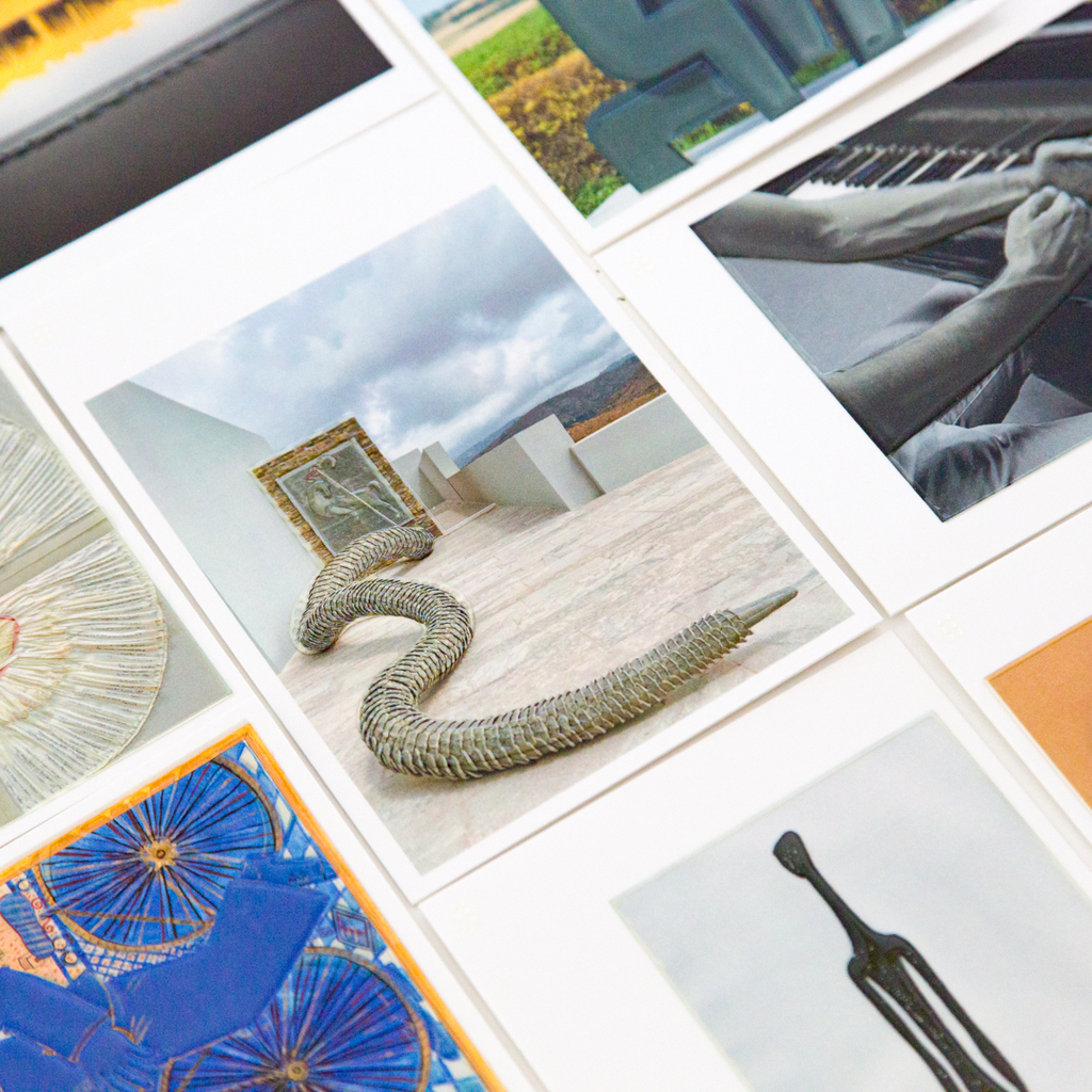 Close-up of postcards from the series featuring, in photographic and tactile form, selected artworks from the participating museums.